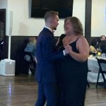 Woman dancing with son