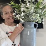 stephanie holding farmhouse style vase decor